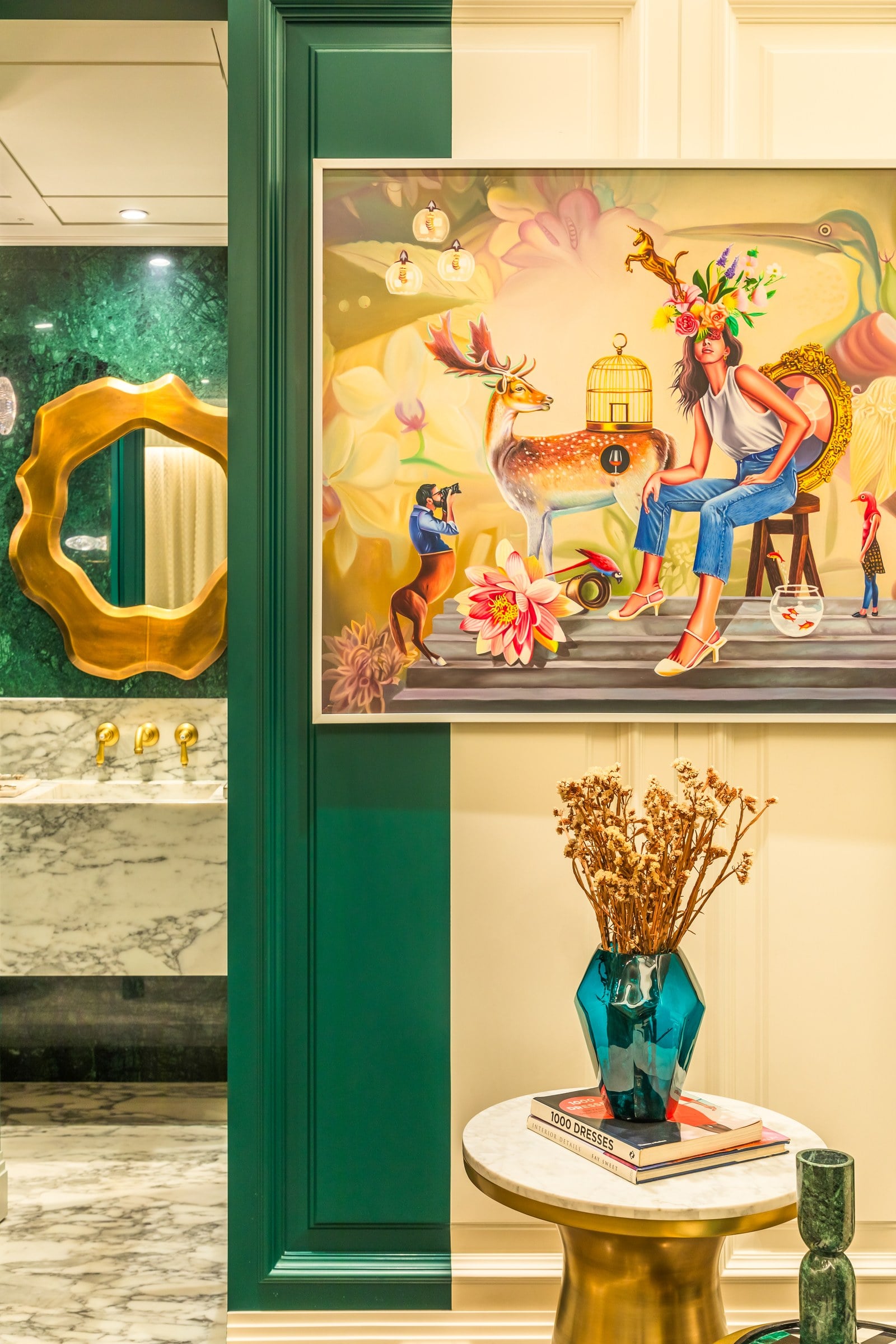 Green-panelled foyer with artwork in the show residence at The Imperial i