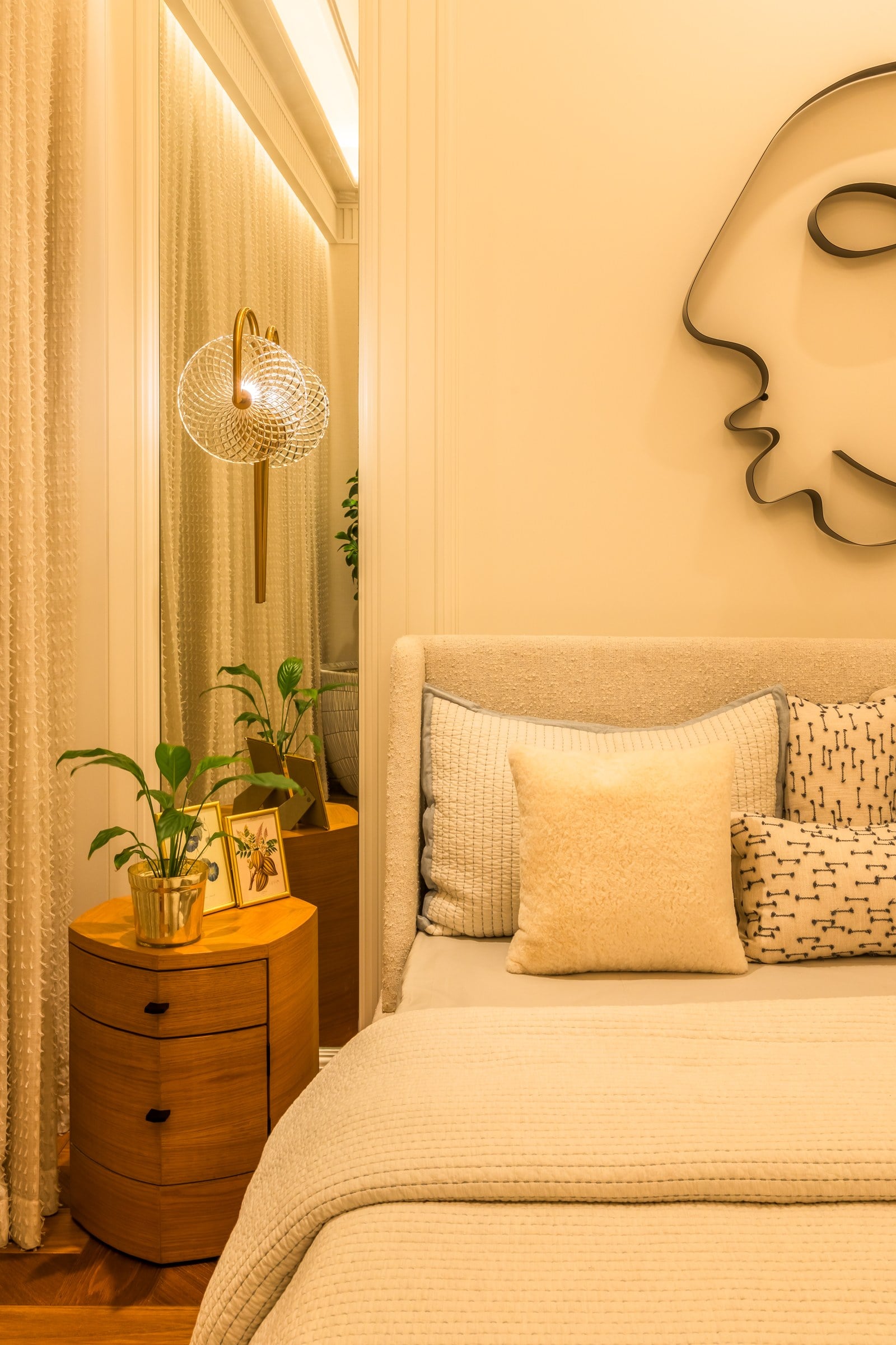 Bedroom detail with wall sculpture in the show residence at The Imperial i