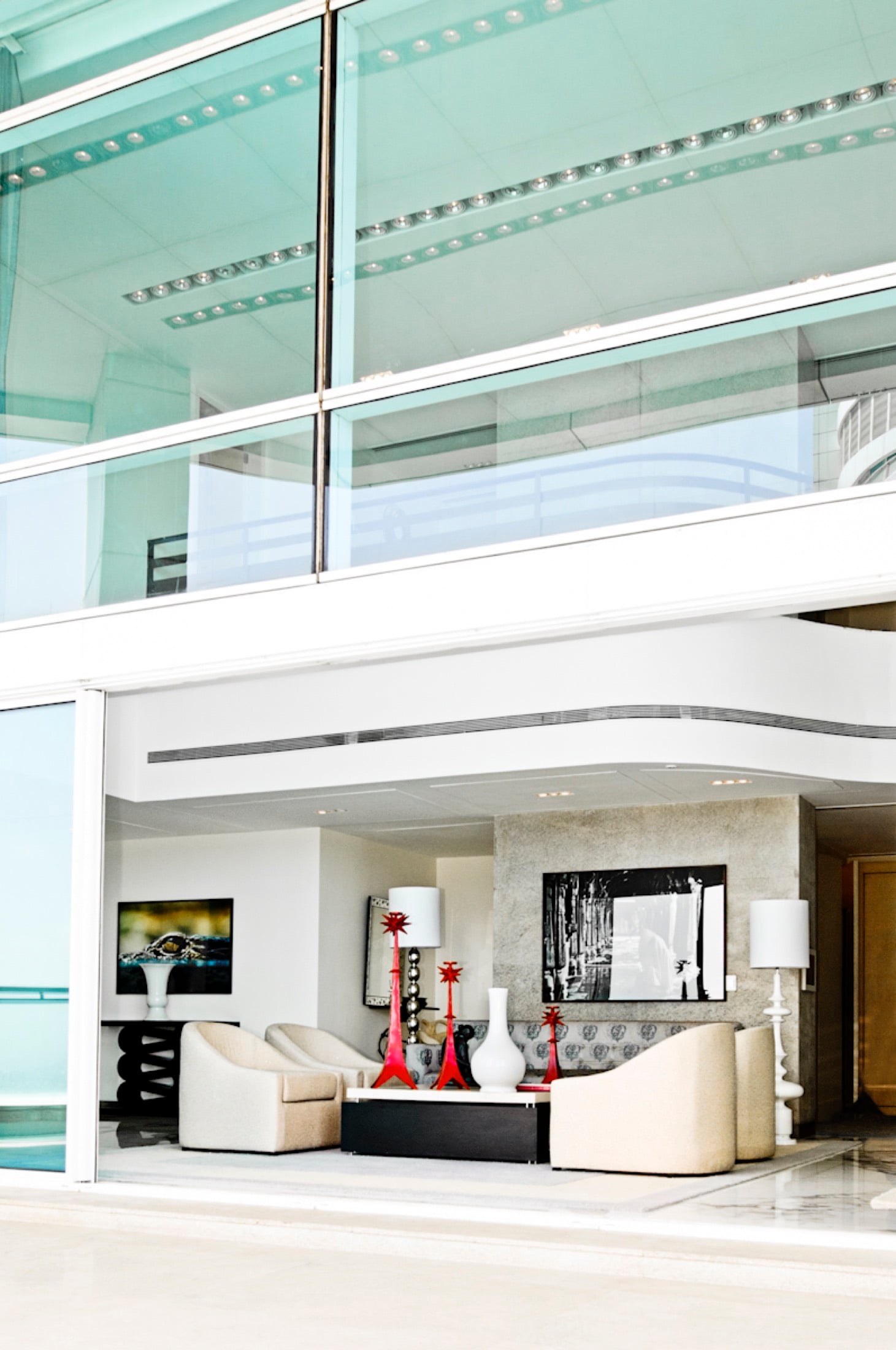 Glass-front living room at The Imperial Towers